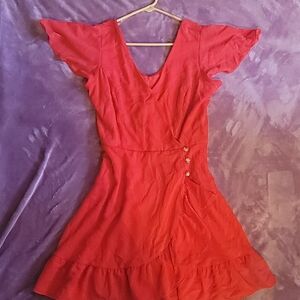 Knee length red dress.